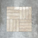Nomadin Brick Creme Wandfliesen im Format 6 × 24,6 cm, im Flechtmuster (Basketweave) verlegt, um den warmen, neutralen Farbton, die glänzende Oberfläche und die feine Oberflächenvariation zu betonen.