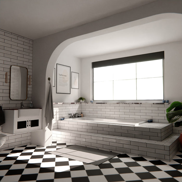 Nireobi Weiß glänzend Fliesen im Handmade-Look, inszeniert in einem Badezimmer mit ziegelartiger Wandverlegung, kombiniert mit einer eingebauten Badewanne, schwarz-weiß gemusterten Bodenfliesen und sanftem Tageslicht.
