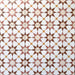 Agadir Terrakotta Fliesen im marokkanischen Stil im Format 20 × 20 cm aus Feinsteinzeug, verlegt in einem sich wiederholenden geometrischen Sternmuster. Die warmen Terrakotta-, Weiß- und sanften Gelbtöne kommen in einer harmonischen Fliesenanordnung besonders gut zur Geltung.