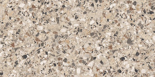 Close-up of the Stuzzi Dolmia 60x120cm terrazzo style porcelain tile, featuring a warm beige base with a blend of cream, taupe, brown, grey and charcoal stone fragments. The realistic 4D brushed finish enhances the texture and depth, creating an authentic terrazzo effect.