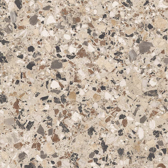 Close-up of the Stuzzi Dolmia 60x60cm terrazzo style porcelain tile, featuring a soft beige base with a blend of cream, taupe, brown, grey and charcoal stone fragments. The realistic 4D brushed finish enhances the texture and depth, creating an authentic terrazzo effect.