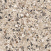 Close-up of the Stuzzi Dolmia 60x60cm terrazzo style porcelain tile, featuring a soft beige base with a blend of cream, taupe, brown, grey and charcoal stone fragments. The realistic 4D brushed finish enhances the texture and depth, creating an authentic terrazzo effect.