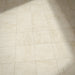 Floor setting featuring Divine Taj Mahal Matt Marble effect 30 × 30cm porcelain tiles, laid in a grid layout, showcasing soft beige tones, subtle veining, and a natural stone-inspired matt finish.