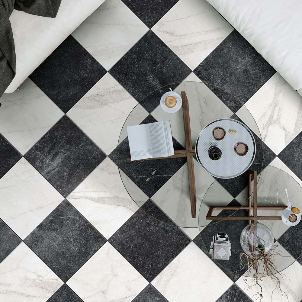 Living room featuring Vitoria Antique Black Marble Style Chequerboard 30 × 30cm porcelain floor tiles, laid in a classic chequerboard pattern and styled with glass coffee tables, neutral furnishings, and contemporary décor.