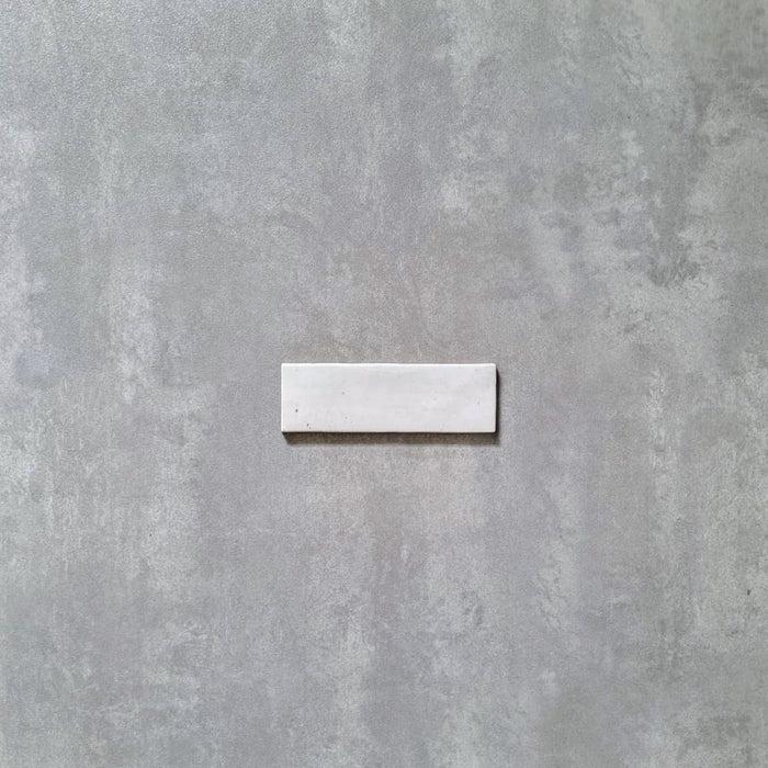 CELÁ VZORKA DLAŽBY Saigon Brick Biela lesklá obkladová dlaždica 5,1 cm x 16,1 cm